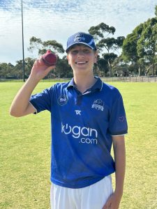 Ethan Sacks below with the very wet match ball.